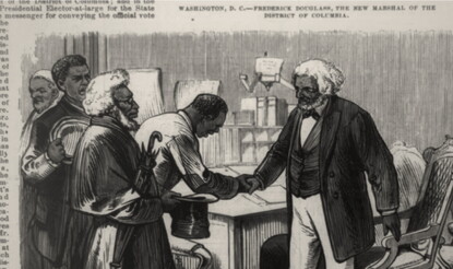 An engraving of a white-haired Frederick Douglass standing at a desk, wearing a dark jacket and waistcoat, dark bow tie, and white shirt and pants, shaking the hand of another Black man as other people wait to greet him at left